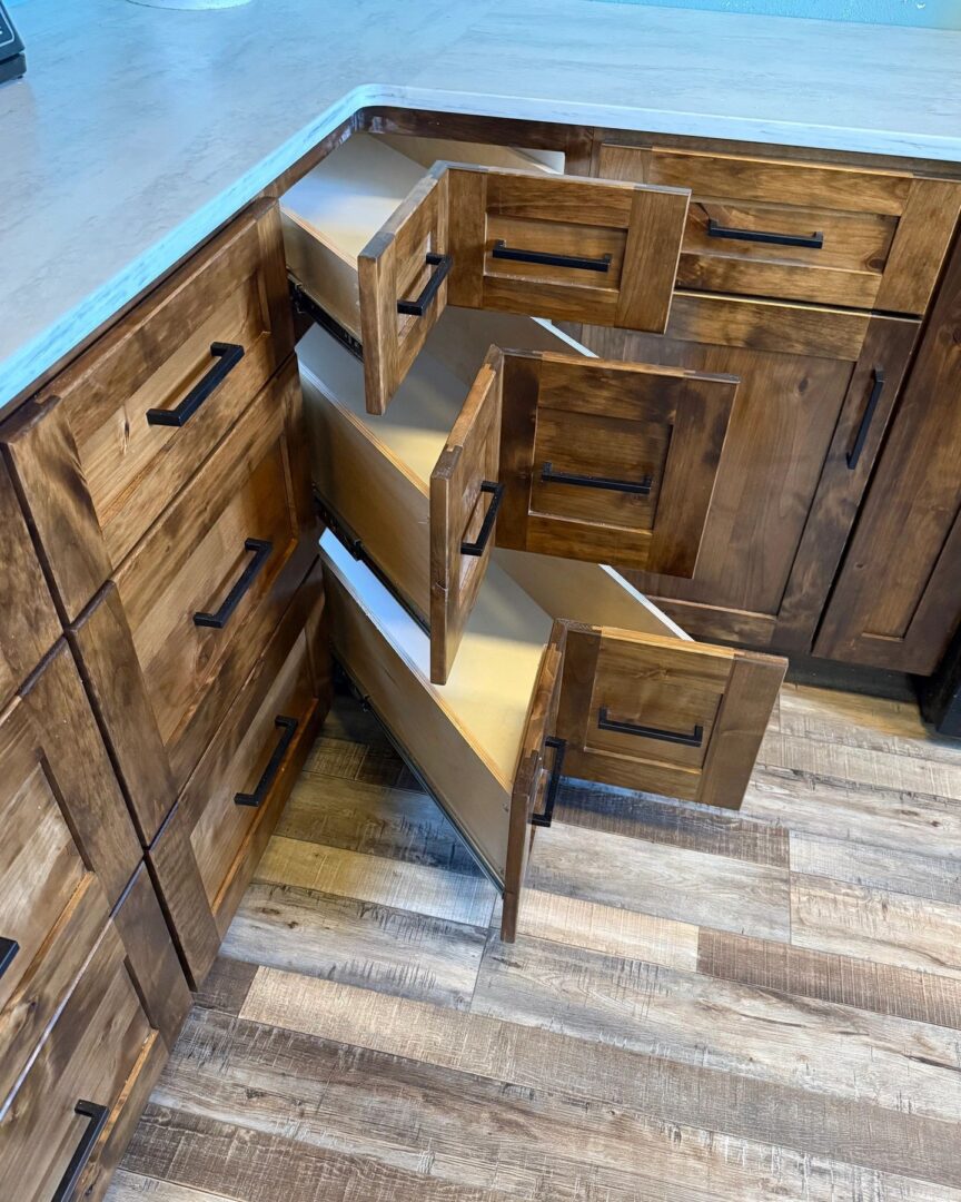 Corner kitchen drawers with unique angled design.